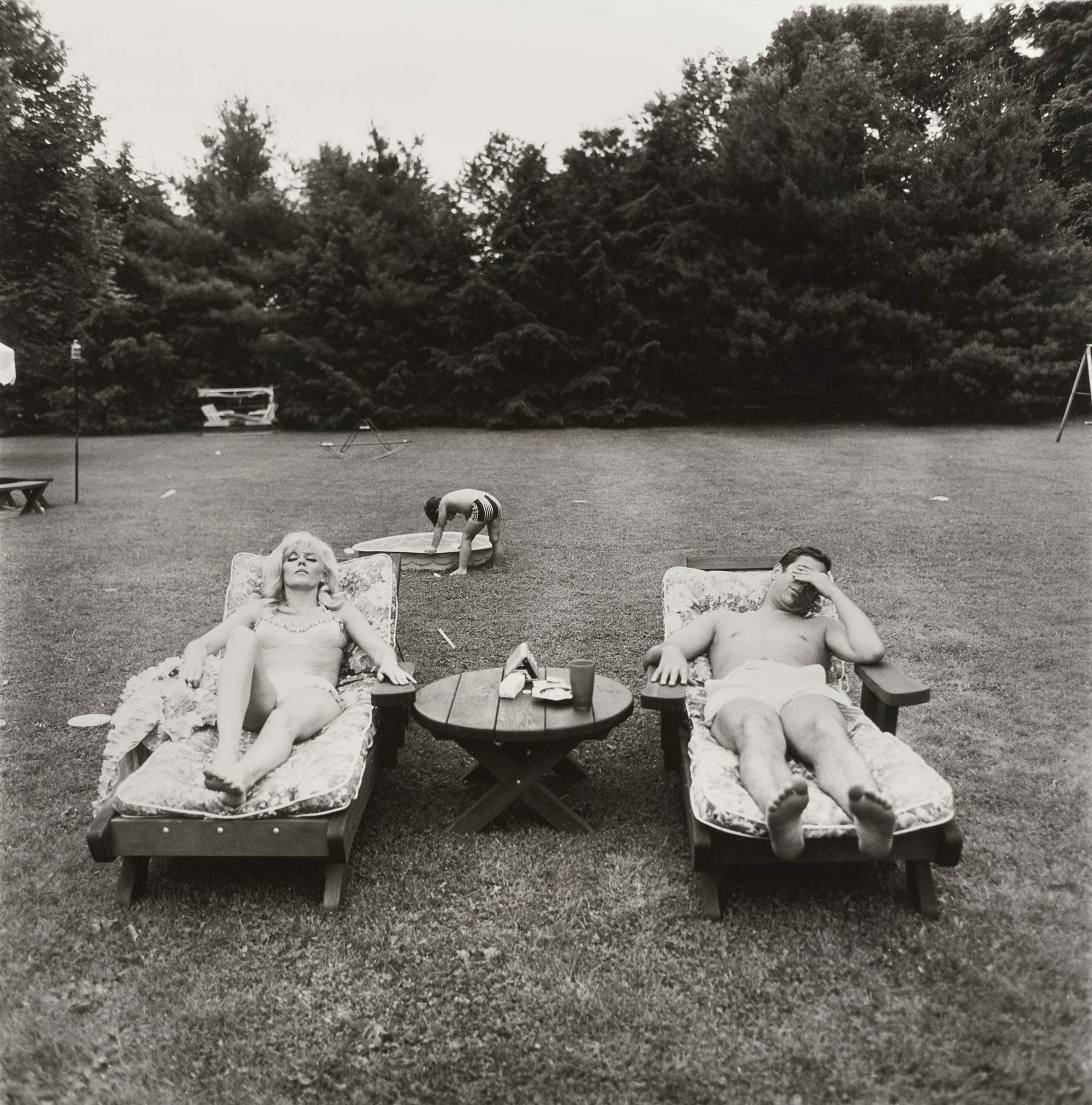 Diane Arbus (American, 1923-1971) 'A family on their lawn one Sunday in Westchester, N.Y.' 1968